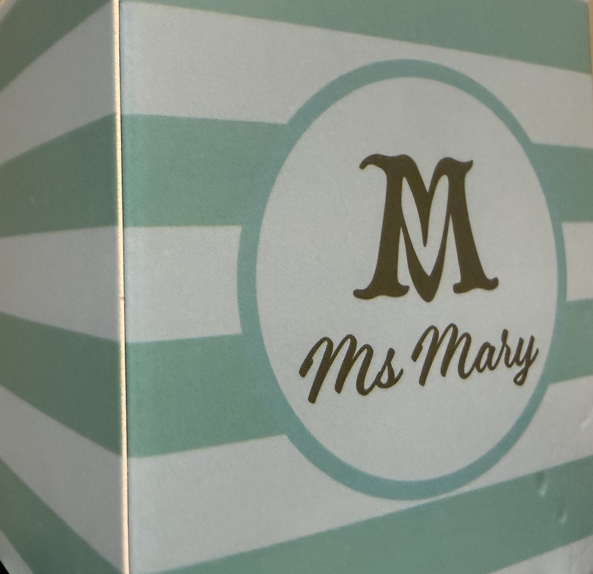 MS Mary signature box with full M logo and Ms Mary name